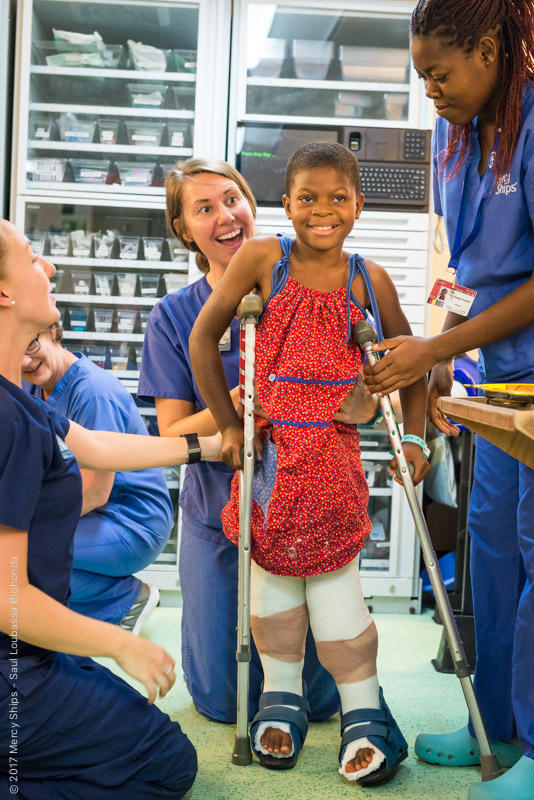 Ortho patient Justine taking her first step few days after surgery