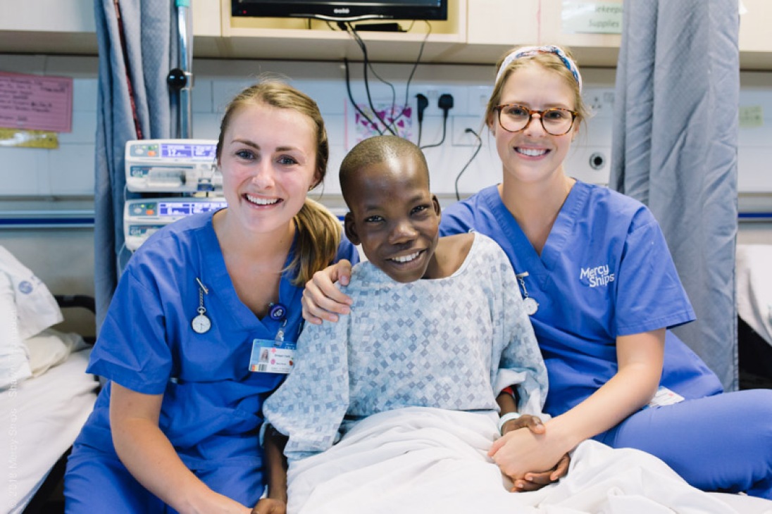 Ward Nurses, Bridget Clark and Tania Rauber, with one of their patients on the ward.